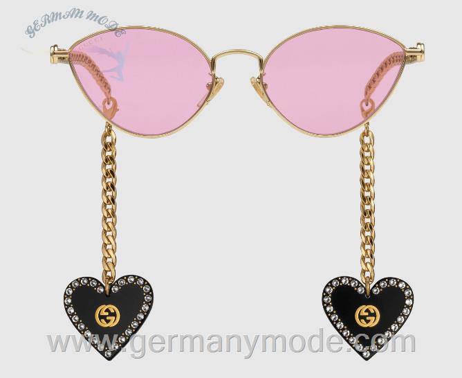 عینک آفتابی زنانه گوچی ایتالیا GUCCI Sonnenbrille in Katzenaugenform mit Herz-Anhängern 663767 I3331 8059